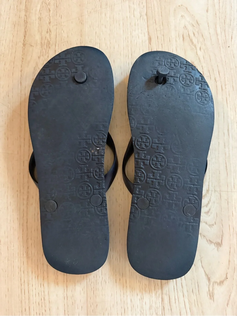Tory Burch Black & White Sunburst Flip Flops with Logo Accent